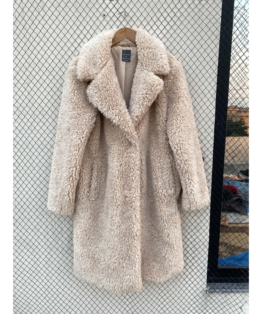 Cream colored, long fur coat