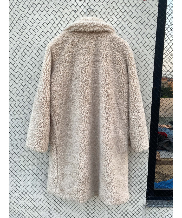 Cream colored, long fur coat