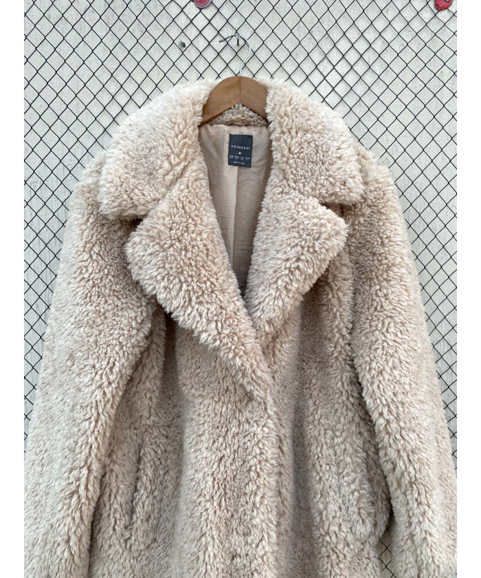 Cream colored, long fur coat
