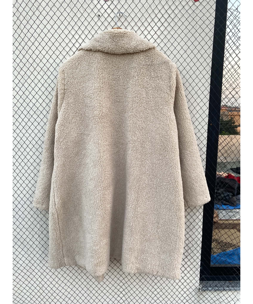 Cream colored, long teddy coat