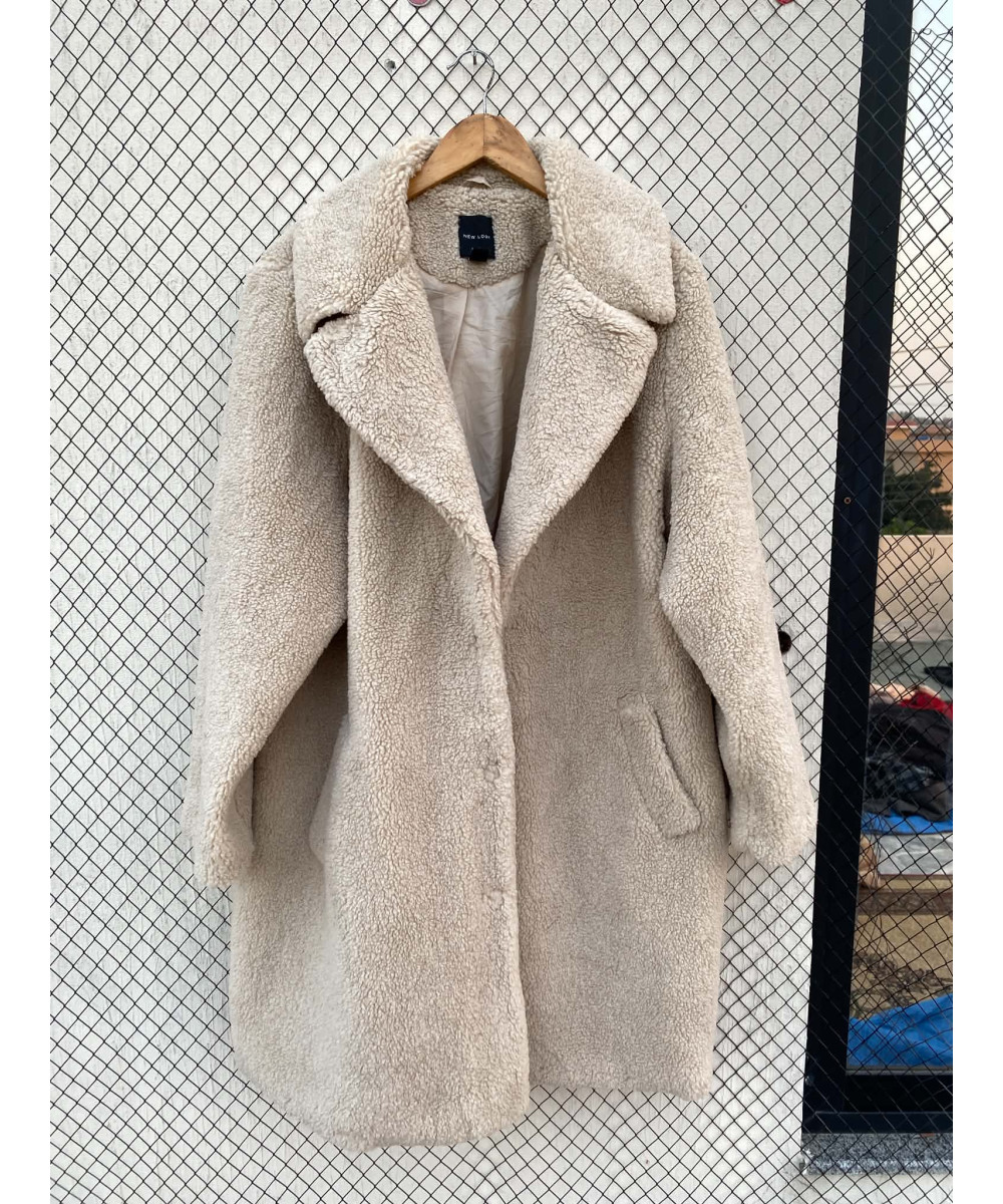 Cream colored, long teddy coat