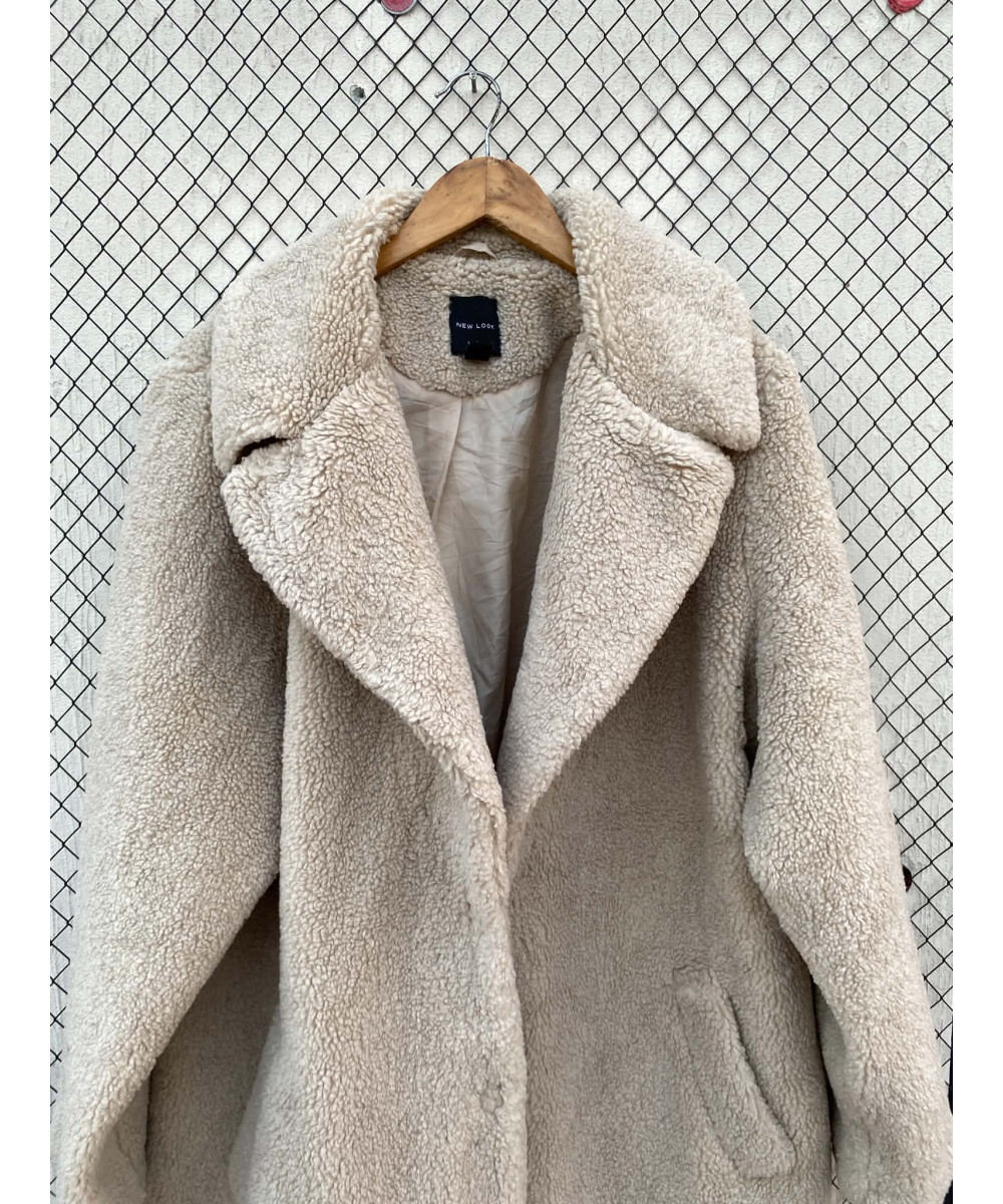 Cream colored, long teddy coat