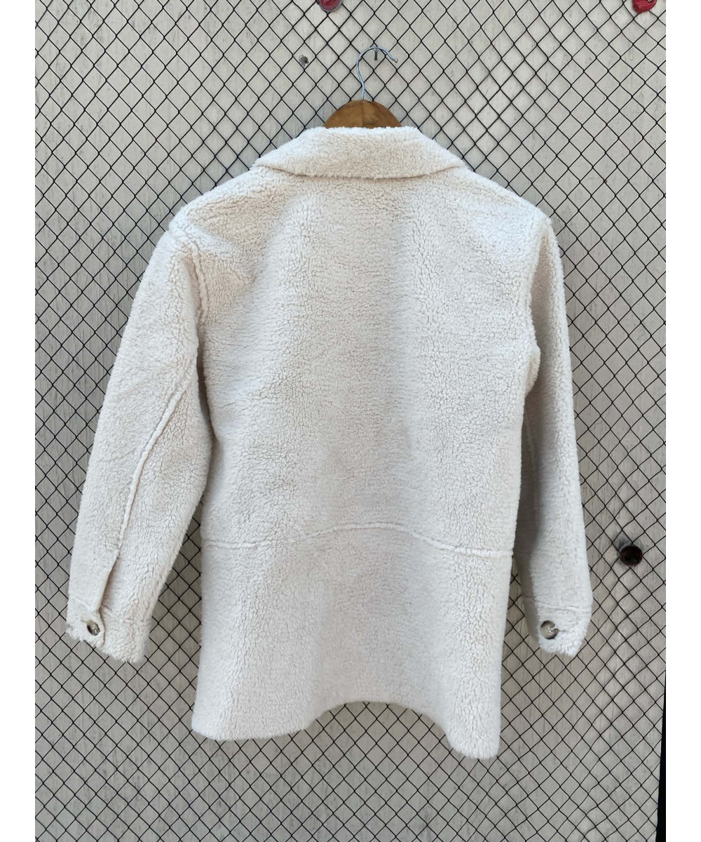 Off white colored, fur jacket