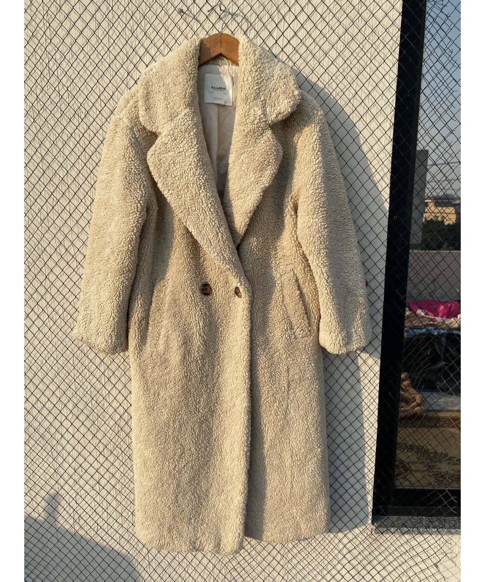 Cream-colored, long, teddy coat