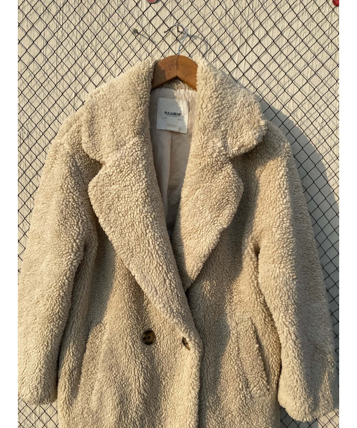 Cream-colored, long, teddy coat
