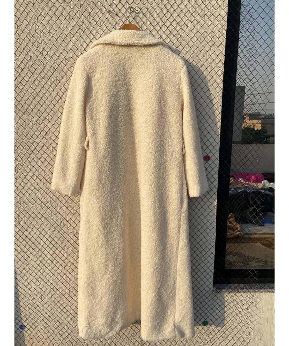 Cream-colored, long teddy coat