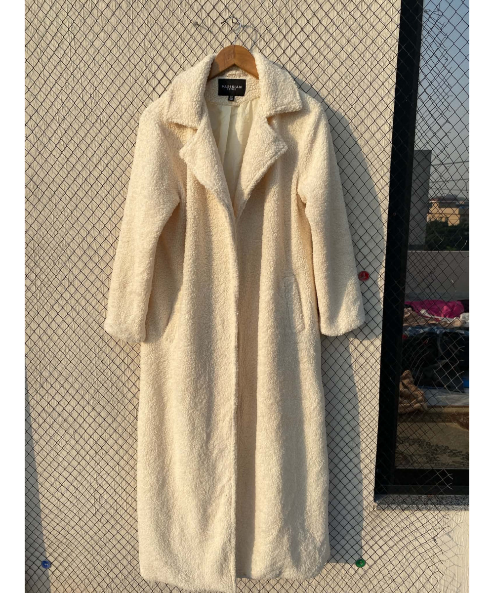Cream-colored, long teddy coat