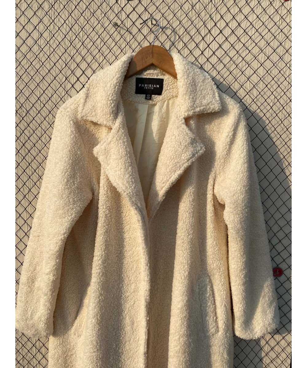Cream-colored, long teddy coat