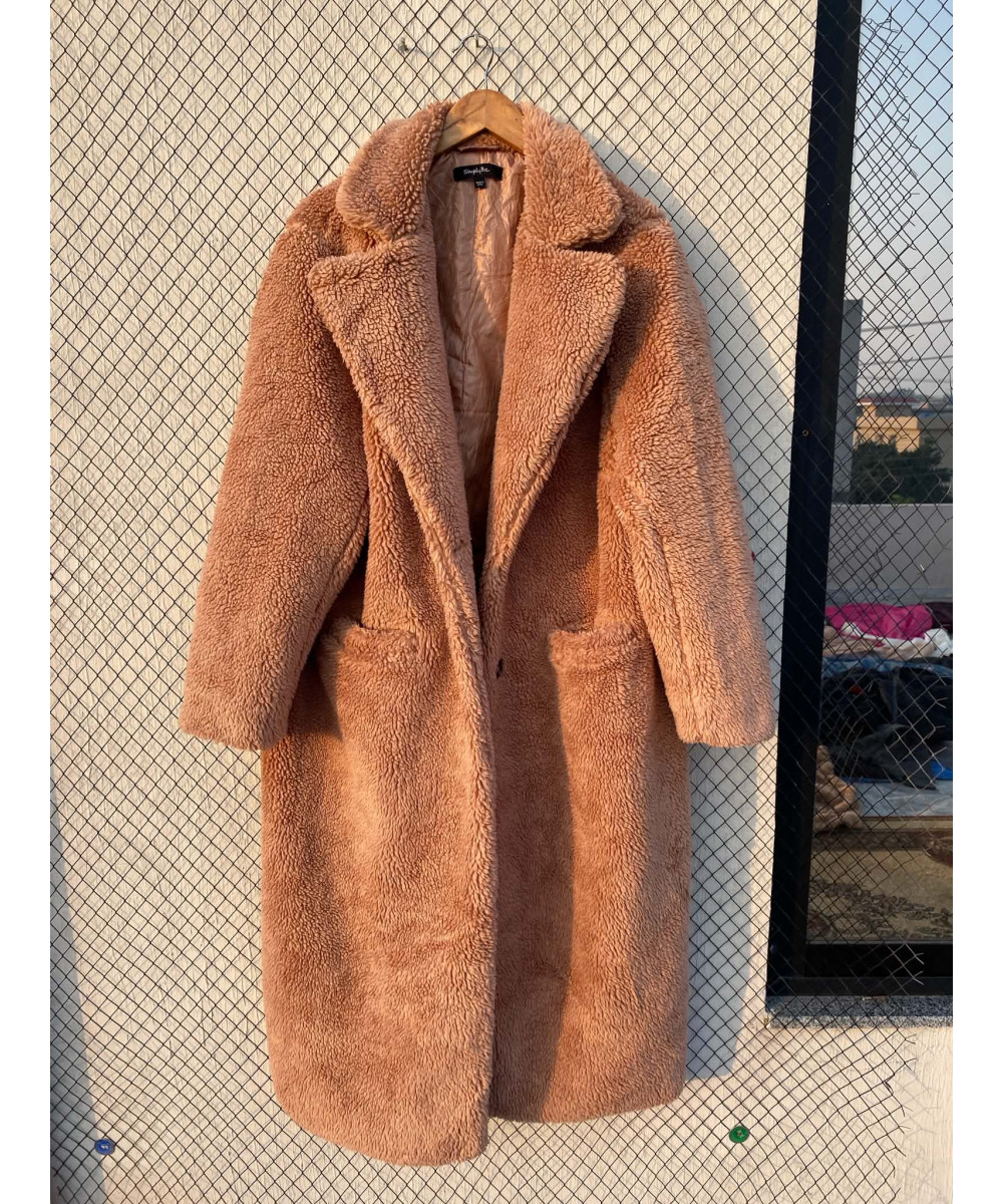Light peach colored, long, teddy coat