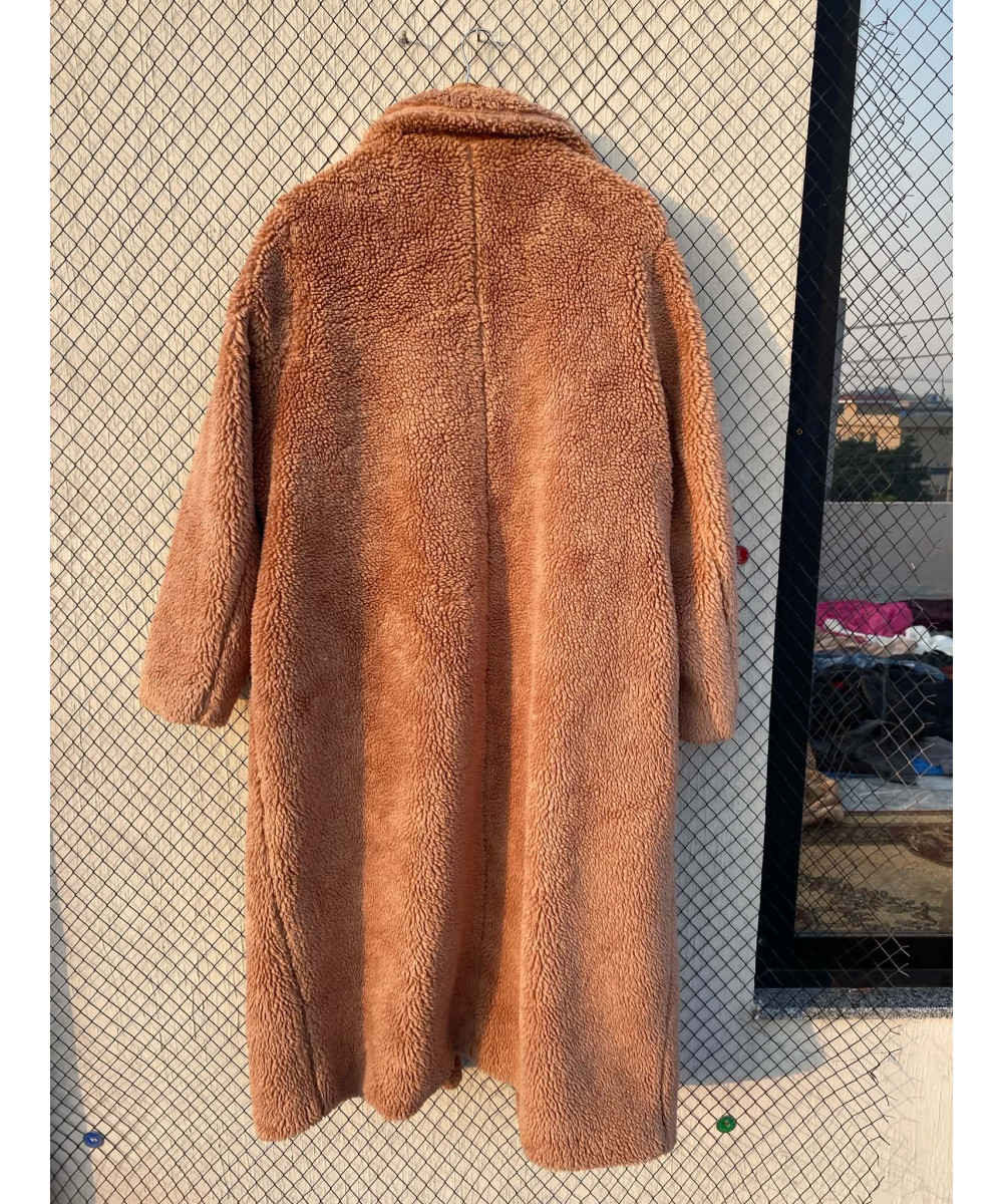 Light peach colored, long, teddy coat