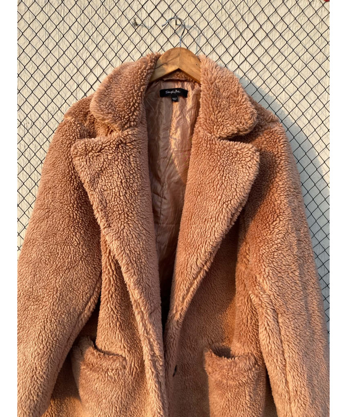 Light peach colored, long, teddy coat