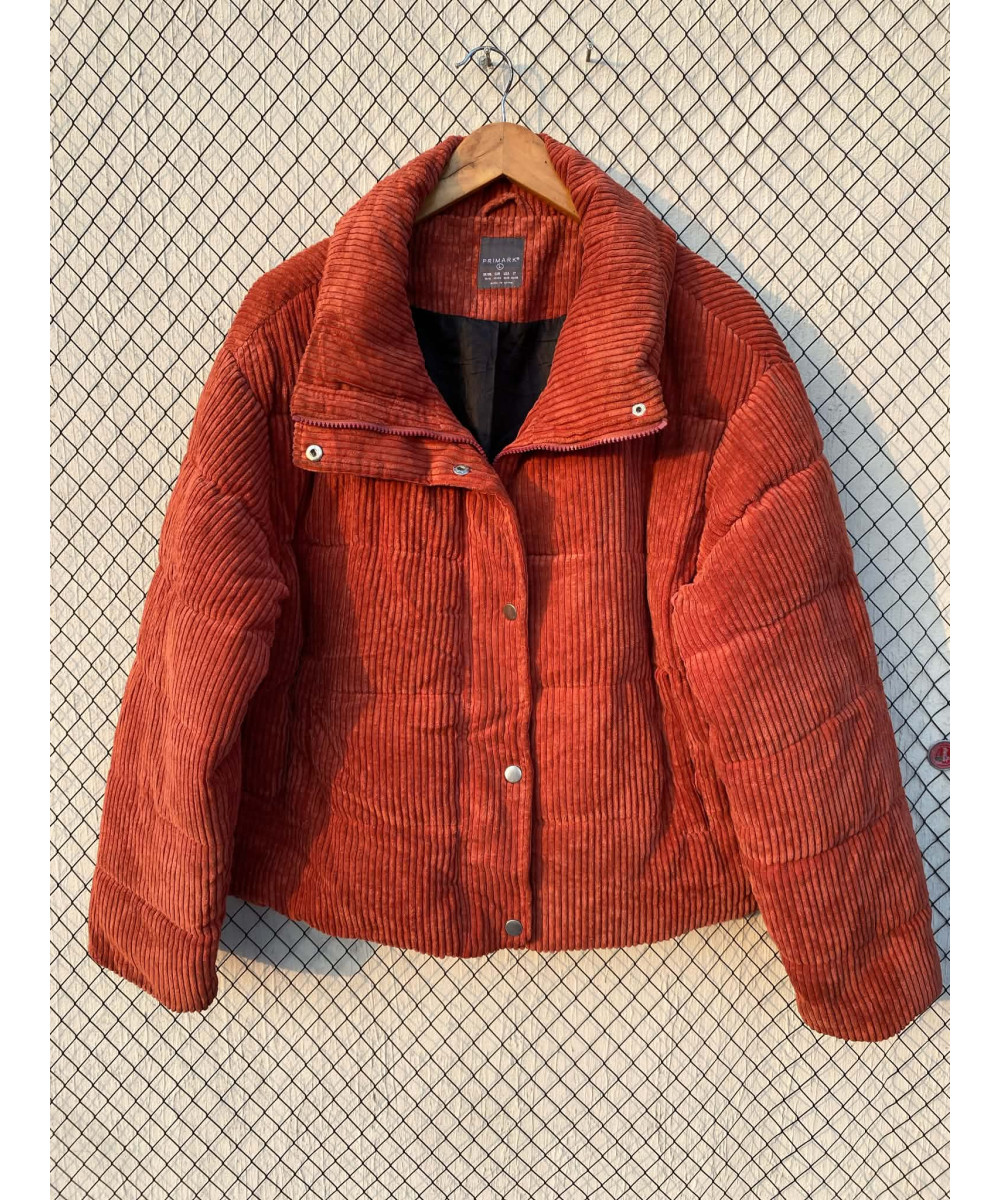 Burnt orange colored, corduroy, puffer, zipper jacket