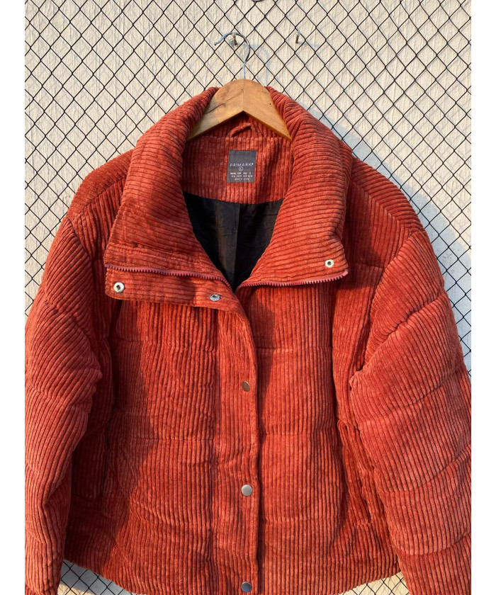 Burnt orange colored, corduroy, puffer, zipper jacket