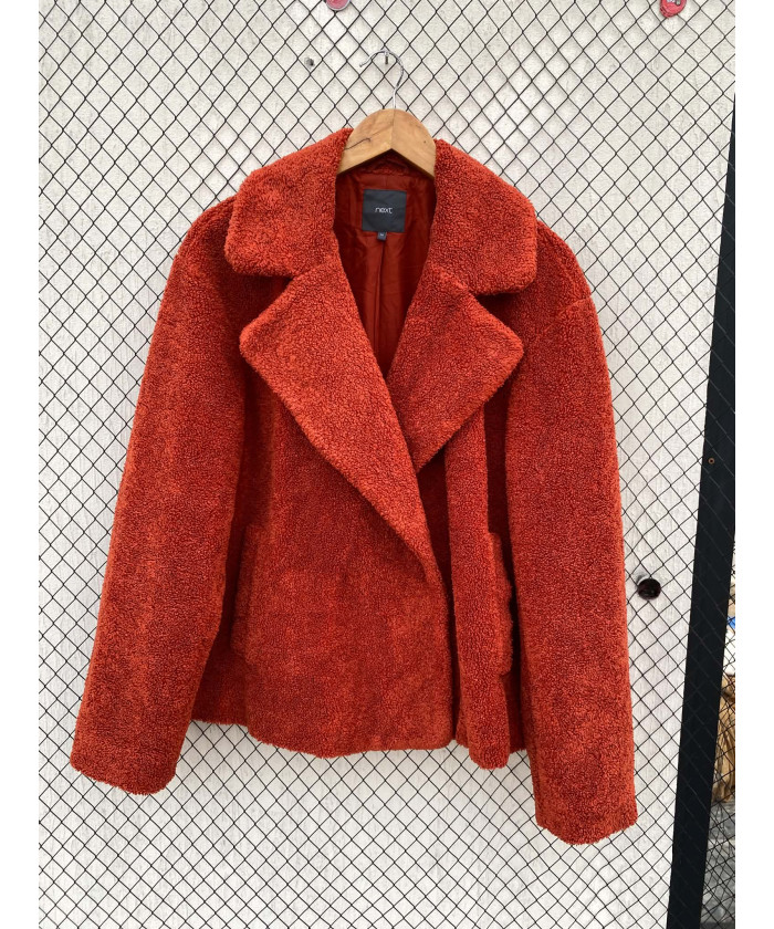 Burnt orange-colored, teddy...
