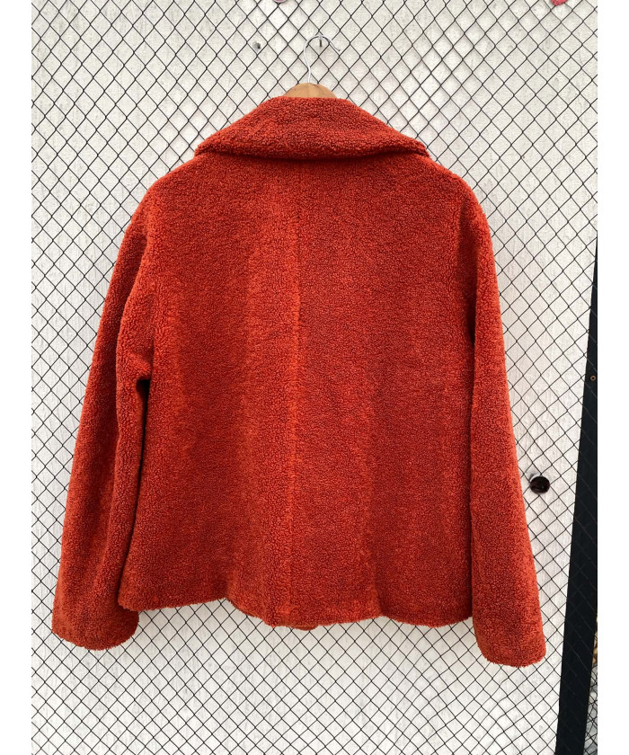 Burnt orange-colored, teddy...