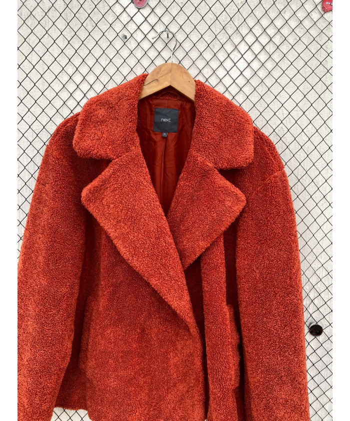 Burnt orange-colored, teddy coat