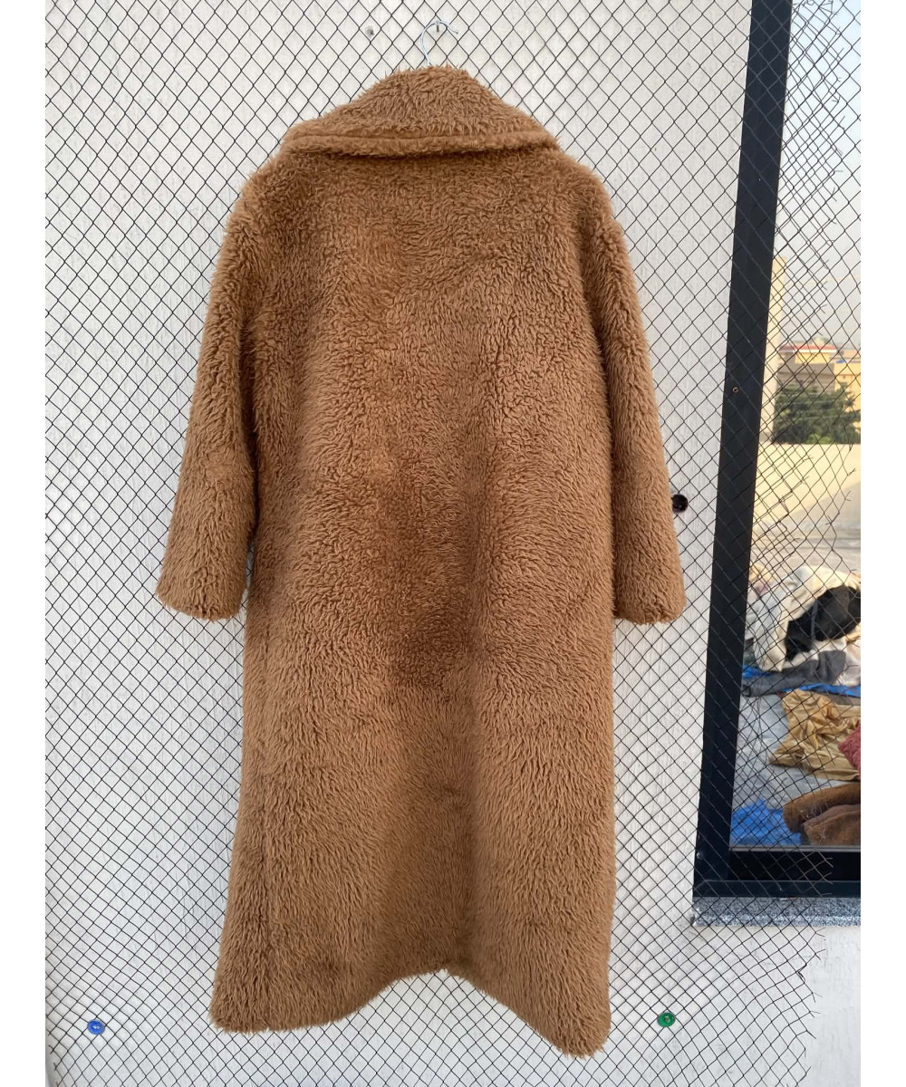 Rust brown-colored, long, faux fur coat