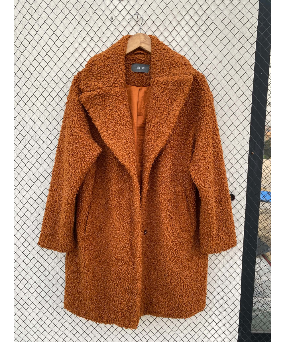 Burnt orange-colored, teddy coat