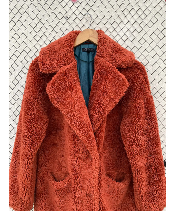 Burnt orange-colored, long, teddy coat
