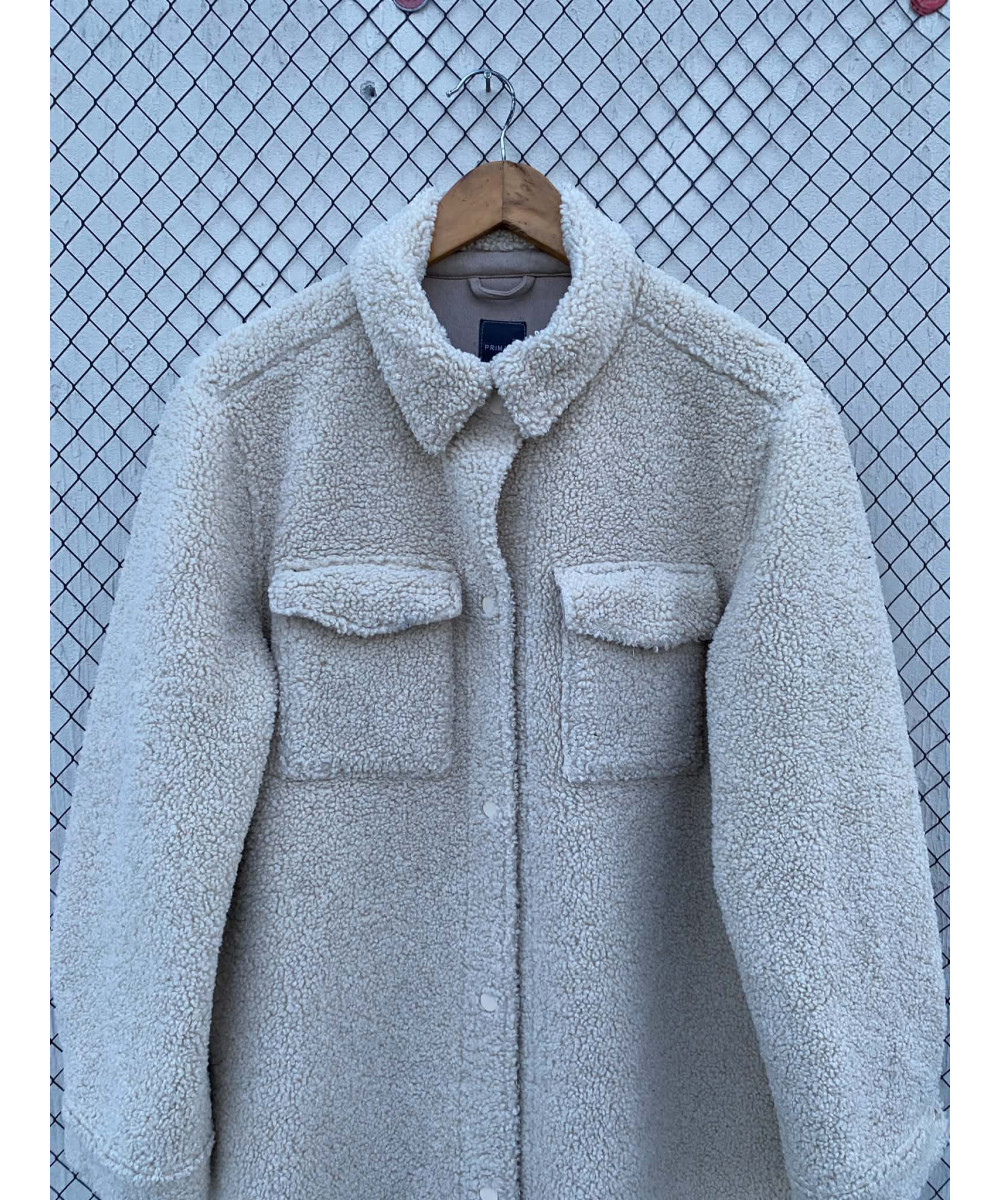 Cream-colored, long, teddy coat