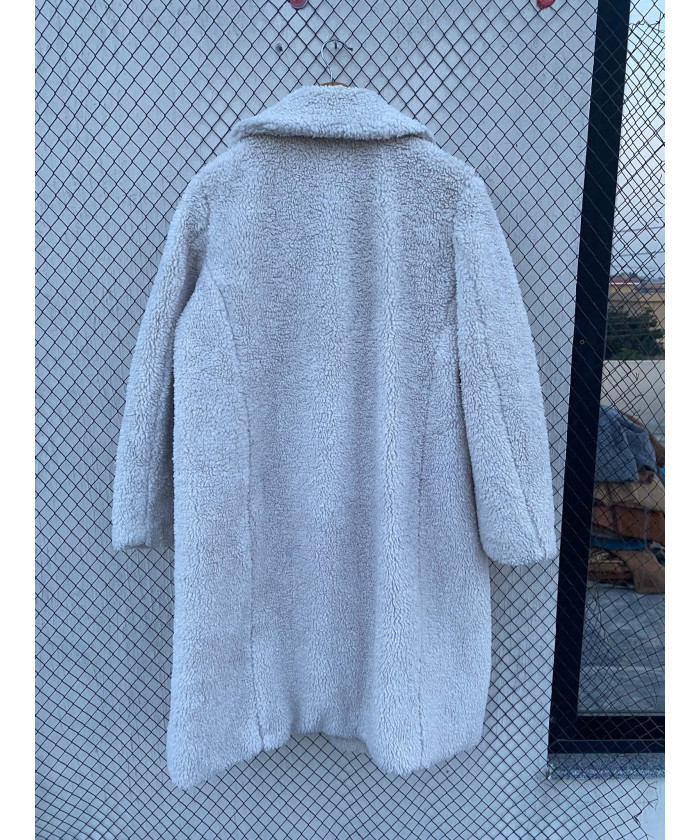 Off-white colored, long,...