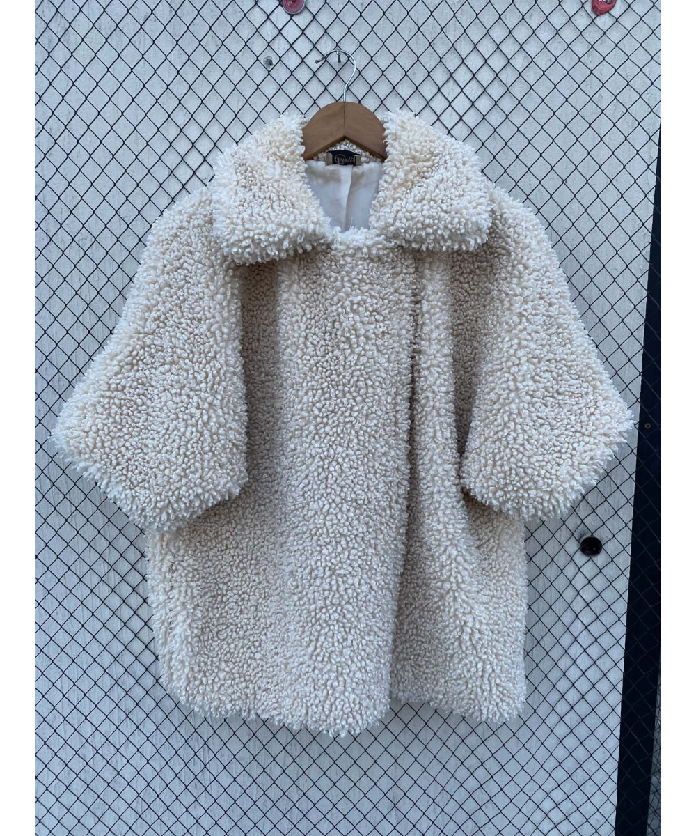 Cream-colored, faux fur jacket