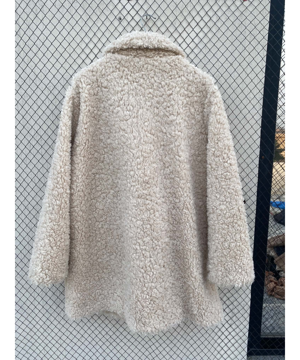 Cream-colored, faux fur coat
