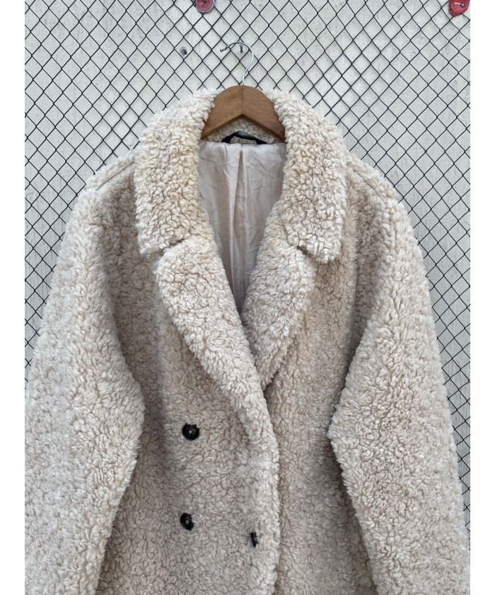 Cream-colored, faux fur coat