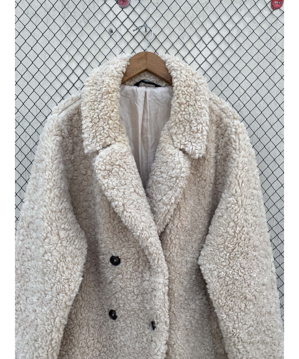 Cream-colored, faux fur coat