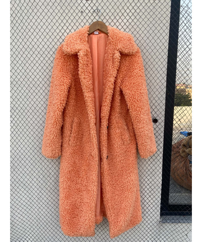 Bright peach-colored, long,...