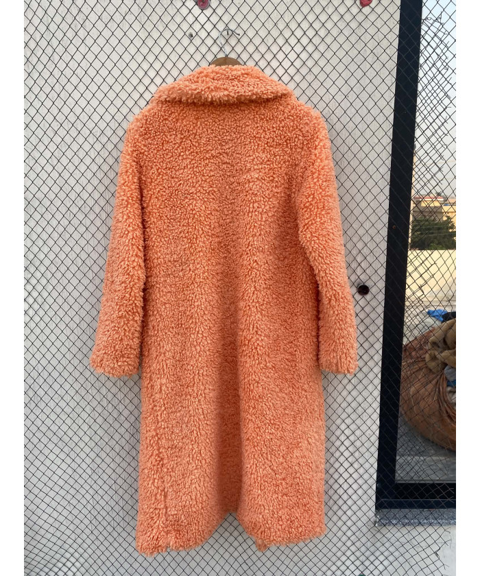 Bright peach-colored, long,...