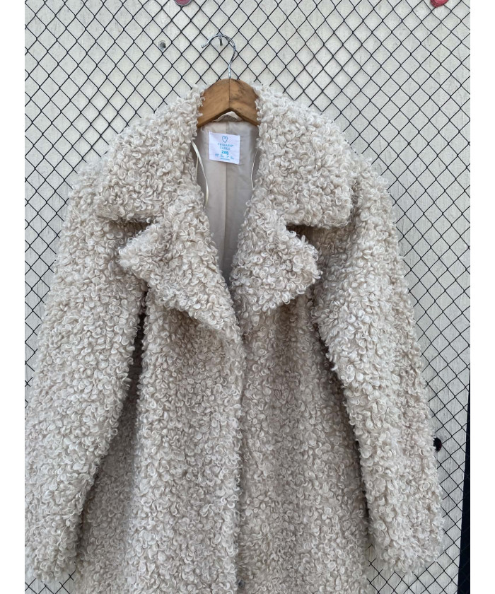 Cream-colored, long, faux fur coat